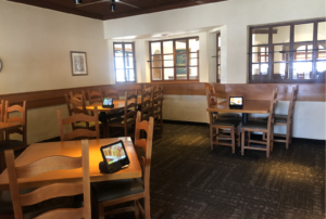 Spacious dining area with tables and chairs