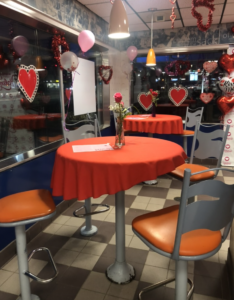 High-top tables decorated for Valentine's Day