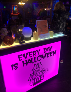 Sign at welcome desk saying, "Every day is Halloween."