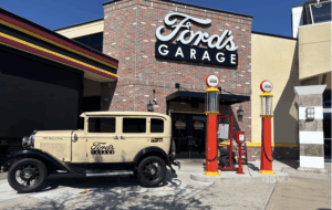 View of street-level, double-door, main entrance of Ford's Garage